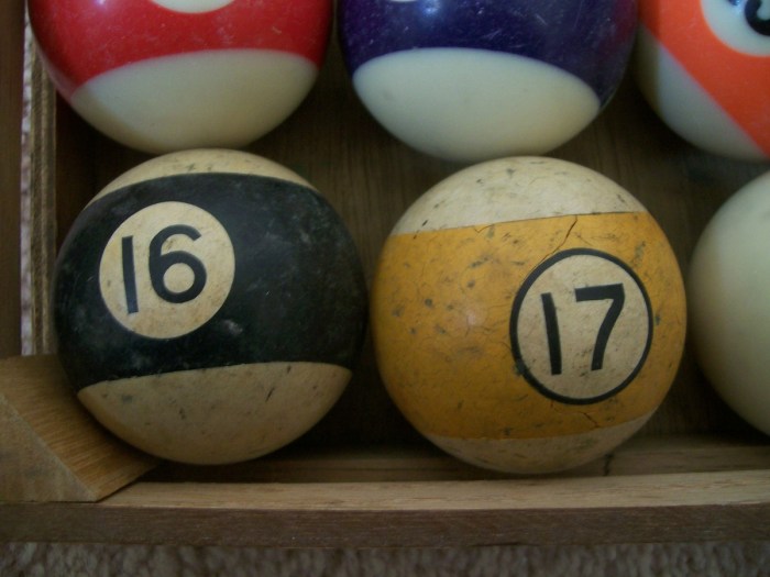 A bowling ball and a billiard ball